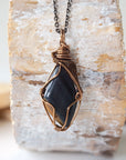 Handcrafted blue tiger's eye necklace for men, front view – artisan antique bronze copper wire wrapping, natural crystal pendant.