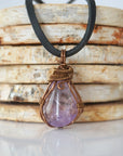 Amethyst necklace for men — handmade bronze copper wire wrapped pendant on black leather cord, February birthstone, by Designs by Nature Gems