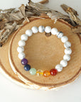 Top view of chakra beaded stretch bracelet, natural white howlite and 7 chakra gemstone beads, unisex design