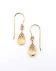 Detailed front view of citrine drop earrings, genuine faceted citrine with minimalist 14k gold filled wire wrapping, Designs by Nature Gems