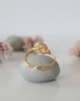 Back view of wire wrapped citrine ring showing artisan craftsmanship and metal wire detail - simple handmade crystal ring back side