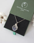 Designs by Nature Gems branded jewelry gift box — raw sapphire silver chain necklace arrives in signature packaging, ready to gift, September birthstone gift for women
