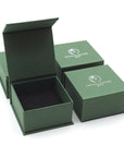Designs by Nature Gems branded jewelry box packaging for rainbow moonstone moon necklace, ready for gifting.