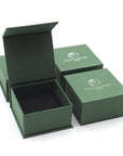 Designs by Nature Gems branded jewelry box packaging for minimalist rainbow moonstone necklace, ready for gifting.