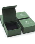 Designs by Nature Gems branded jewelry box packaging for rainbow moonstone and lotus necklace, ready for gifting.