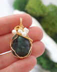Emerald and freshwater pearl necklace pendant in hand for size reference, artisan birthstone jewelry gift for her