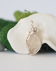 Back detail of silver wire wrapped herkimer diamond and freshwater pearl pendant necklace, handcrafted gemstone jewelry