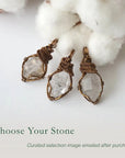 Three raw Herkimer diamond pendants for men showing natural variation in crystal shape, size, and artisan wrapping.
