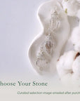 Three raw Herkimer diamond pendants for women showing natural variation in crystal shape, size, and artisan wrapping.