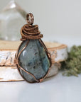 Right side view of labradorite pendant — antique bronze wire wrapping detail, handmade crystal necklace for women