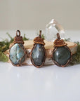 Labradorite pendants showing variation in size, shape, and unique flash — select your own pendant, one of a kind by nature