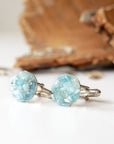 Left side angle of men's aquamarine cufflinks, multiple aquamarines, white gold finish copper