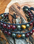 Close-up of garnet, tiger’s eye, and pyrite beads on a handcrafted men’s leather wrap bracelet