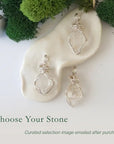 Three Herkimer diamond pendants showing natural variation in crystal size, shape, and handcrafted wire wrapping.