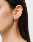 Woman wearing natural turquoise stud earrings - December birthstone sterling silver studs for everyday wear