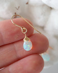 Opal drop earrings in hand for size reference, natural faceted opal, 14k gold filled