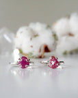 Two pink ruby adjustable rings showing natural variation in stone size, shape, and colour — choose your ruby ring, one of a kind by nature