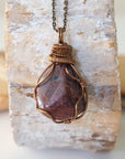 Large polished raw ruby necklace for men with antique bronze wire wrapped pendant on matching bronze cable chain — handmade crystal jewelry by Designs by Nature Gems