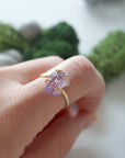 Raw amethyst ring for women in 14k gold vermeil claw setting, adjustable band on model hand