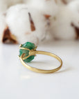 Back view of adjustable gold vermeil emerald ring showing ring band and handcrafted setting details