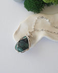 Raw emerald necklace in soft silver copper wire by Designs by Nature Gems, handcrafted May birthstone pendant for women.