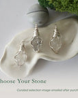 Three different raw Herkimer diamond pendants displayed for variation reference
