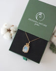 Raw rainbow moonstone necklace in 14k gold filled displayed in branded Designs by Nature Gems jewelry box. Artisan June birthstone gift for women.