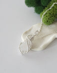 Raw rainbow moonstone necklace with 925 sterling silver wire wrapped pendant on silver chain