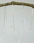 Detailed view of sterling silver chain used for Herkimer diamond and lotus necklace.