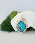 Back detail of silver wire wrapped turquoise and freshwater pearl pendant necklace, handcrafted gemstone jewelry