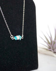 Raw turquoise freshwater pearl bar pendant right angle close up detail view