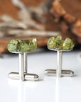 Side angle of peridot cufflinks showing T-bar toggle hardware — white gold finish over copper, genuine raw peridot cluster face, handcrafted men's August birthstone jewelry