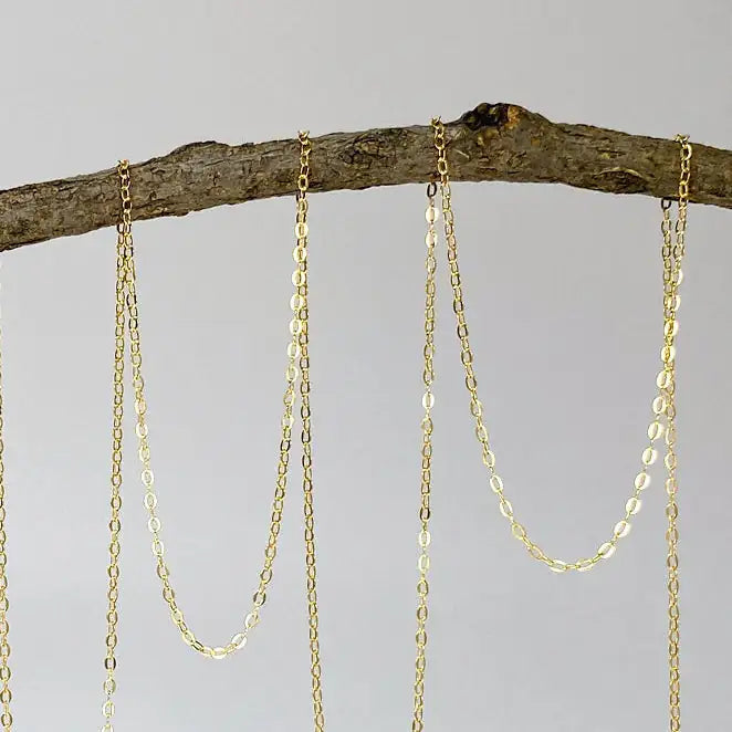 Detailed view of 14k gold filled chain used for Herkimer diamond and lotus necklace.