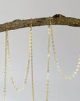 Detailed view of 14k gold filled chain used for Herkimer diamond and lotus necklace.