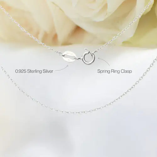 Close-up of 925 sterling silver fine cable chain with 925 stamp and spring clasp closure for rainbow moonstone lotus necklace.