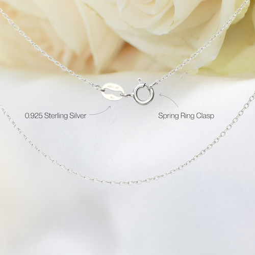 Close-up of 925 sterling silver fine cable chain with 925 stamp and spring clasp closure for rainbow moonstone and pearl bar necklace.