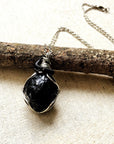 Handcrafted apache tears obsidian necklace for men, front view – artisan white gold and black copper wire wrapping, natural volcanic glass, Designs by Nature Gems.