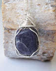 Back view of handcrafted sapphire necklace for men – natural stone and wire wrapping, September birthstone, 925 sterling silver.