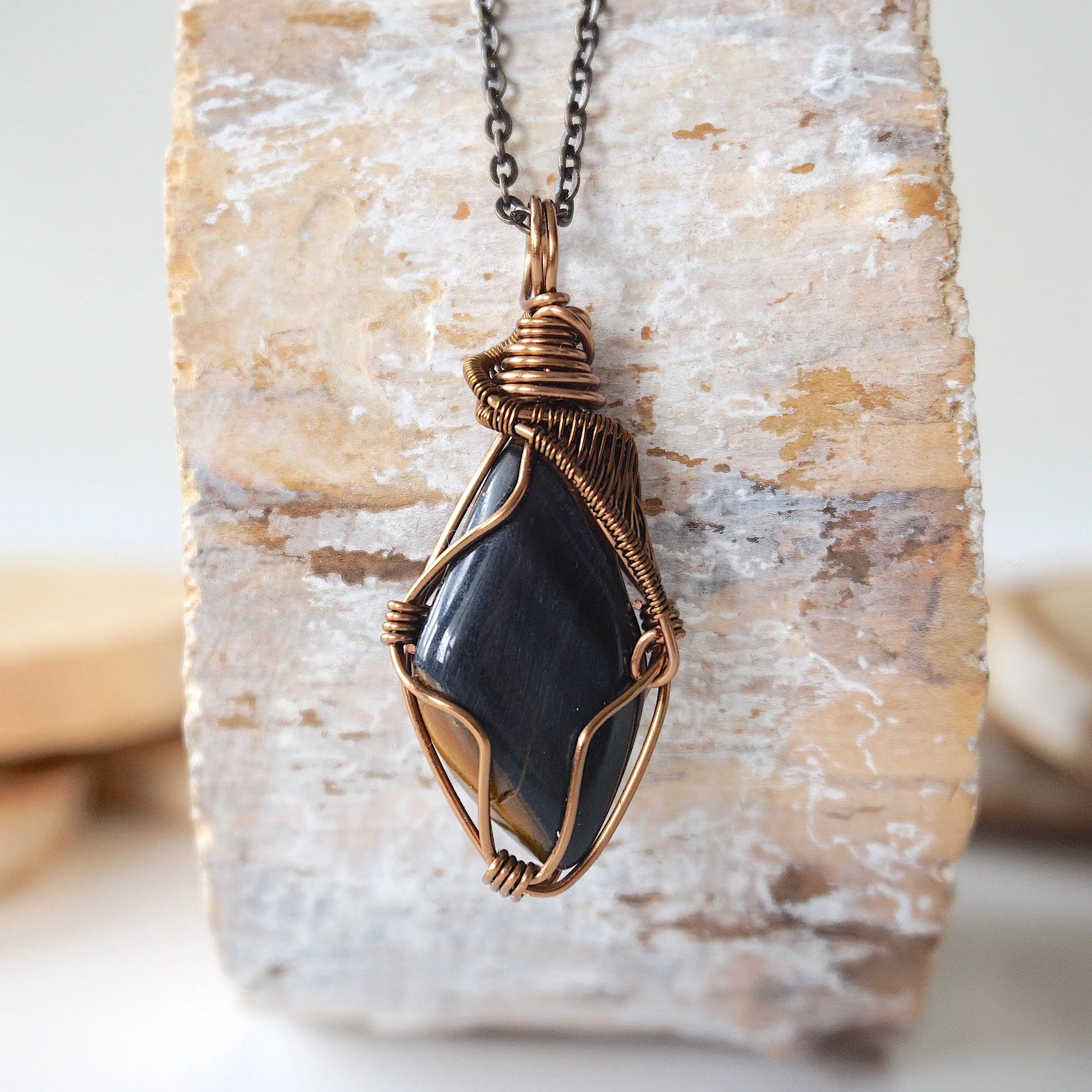 Handcrafted blue tiger's eye necklace for men, front view – artisan antique bronze copper wire wrapping, natural crystal pendant.