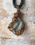 Handcrafted Australian boulder opal necklace for men, front view on black leather cord – artisan antique bronze copper wire wrapping, natural crystal pendant.