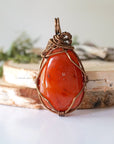 Back view of handcrafted carnelian necklace – natural stone and wire wrapping detail, Virgo birthstone pendant, Designs by Nature Gems.