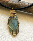 Back view of handcrafted green kyanite necklace for men – natural stone and wire wrapping, alternative May birthstone, antique bronze and gold copper.
