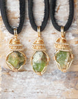 Three raw peridot necklaces for men – shows natural variation in size, shape, and green color of peridot stones.