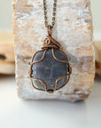 Back view of handcrafted sapphire necklace – natural stone and wire wrapping detail, September birthstone pendant by Designs by Nature Gems.