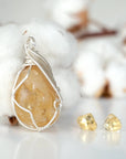 Side view of raw citrine necklace and earrings set showing wire wrapping detail and natural stone texture
