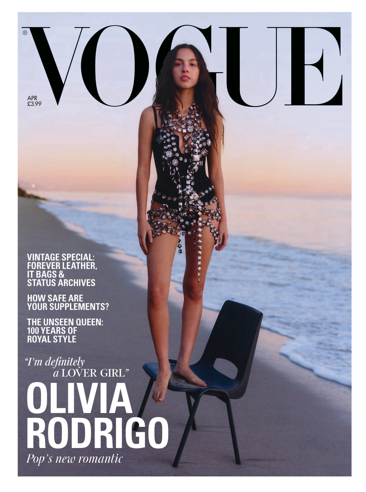 Vogue magazine cover featuring a woman on a beach with text and branding.