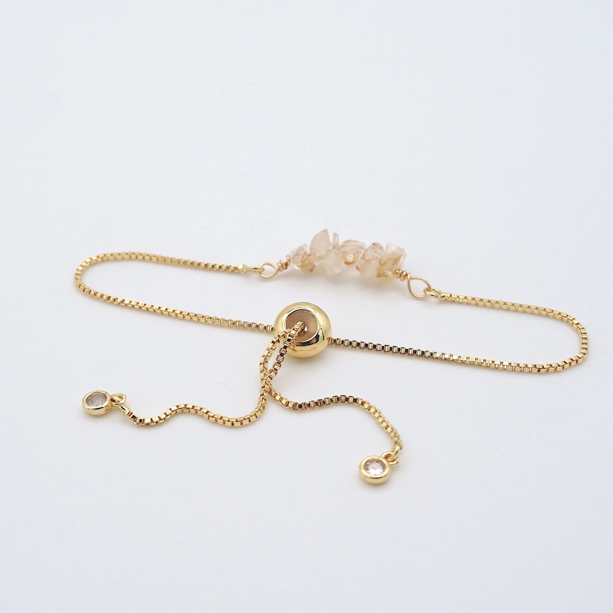 Gold plated brass slider closure on adjustable citrine bracelet showing easy fit mechanism - handcrafted birthstone jewelry