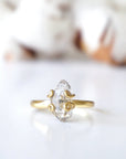 Detailed front view of adjustable raw Herkimer diamond ring in 14k gold vermeil focused on the natural stone.