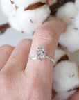 Adjustable raw Herkimer diamond ring in 925 sterling silver worn on a female model’s hand.