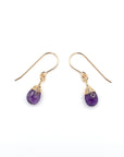 Side angle of amethyst drop earrings, minimalist artisan wire wrapping, 14k gold filled